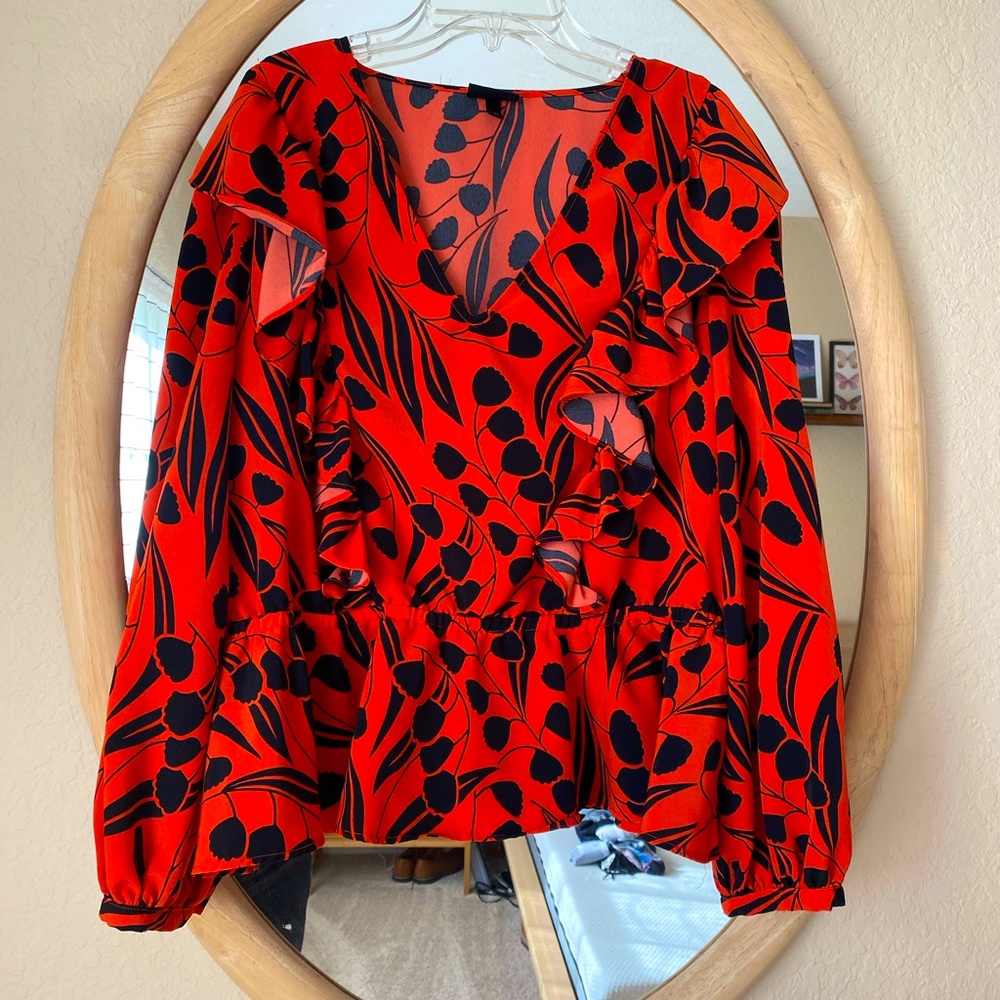 Business friendly, peplum top.